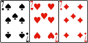 The sevens of spades, hearts, and diamonds.
